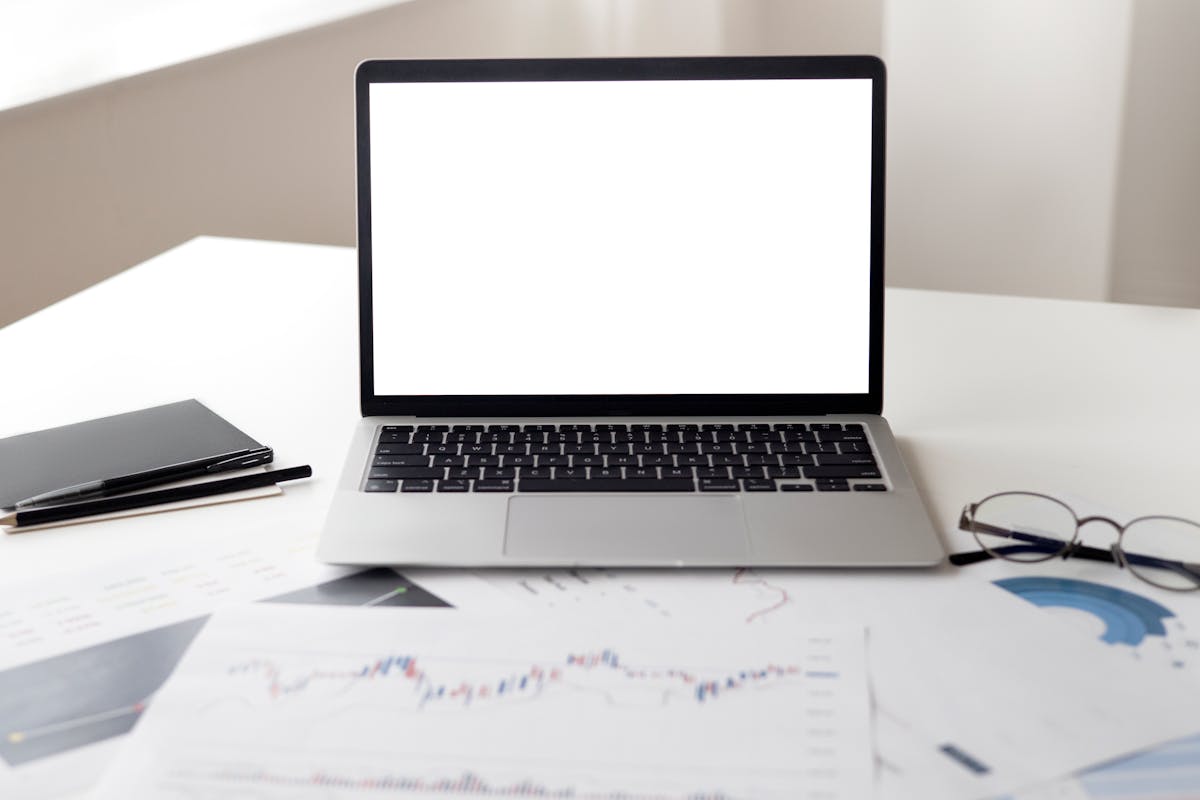Small business owner reviewing AI marketing automation dashboard